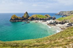 A turquoise cove with a sandy beach in beautiful Cornwall